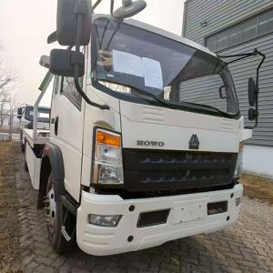 Two 15-Ton SINOTRUK HOWO Wrecker Tractor Units Arrive at Port for Shipment to the Republic of the Congo
